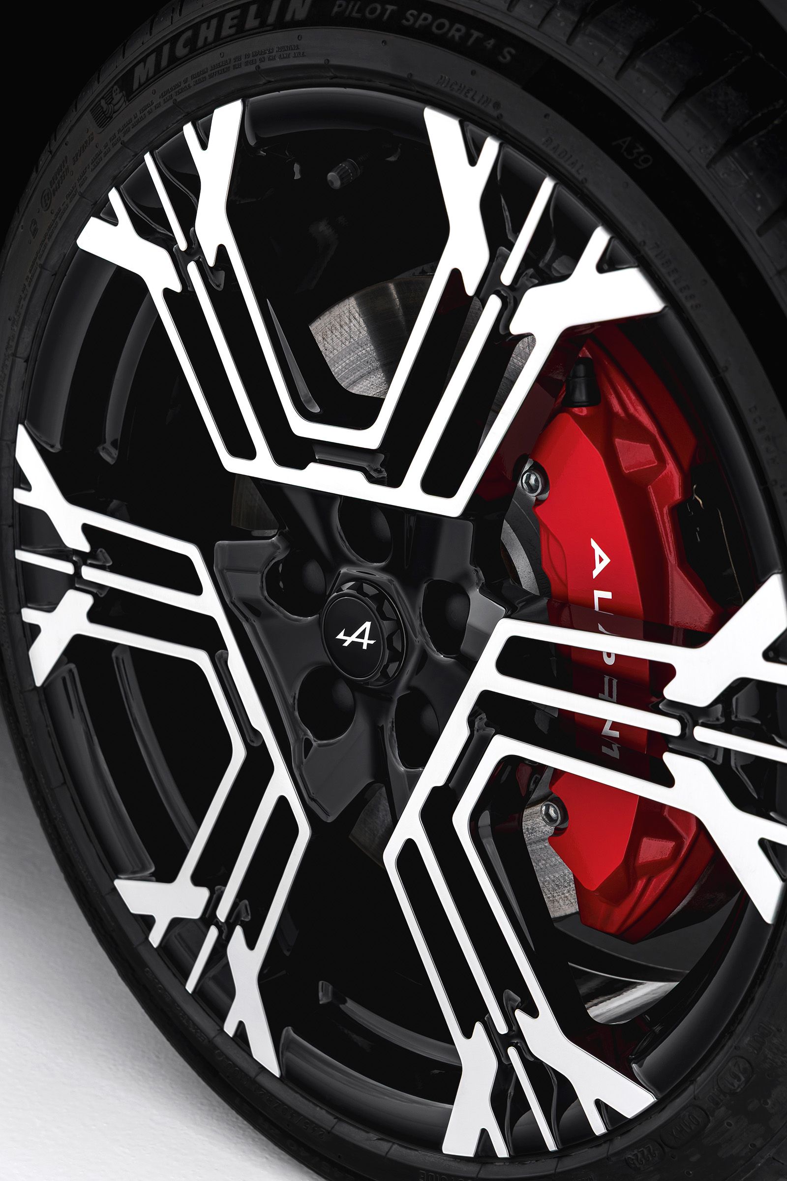 Image may contain Machine Wheel Alloy Wheel Car Car Wheel Spoke Tire Transportation Vehicle and Bicycle