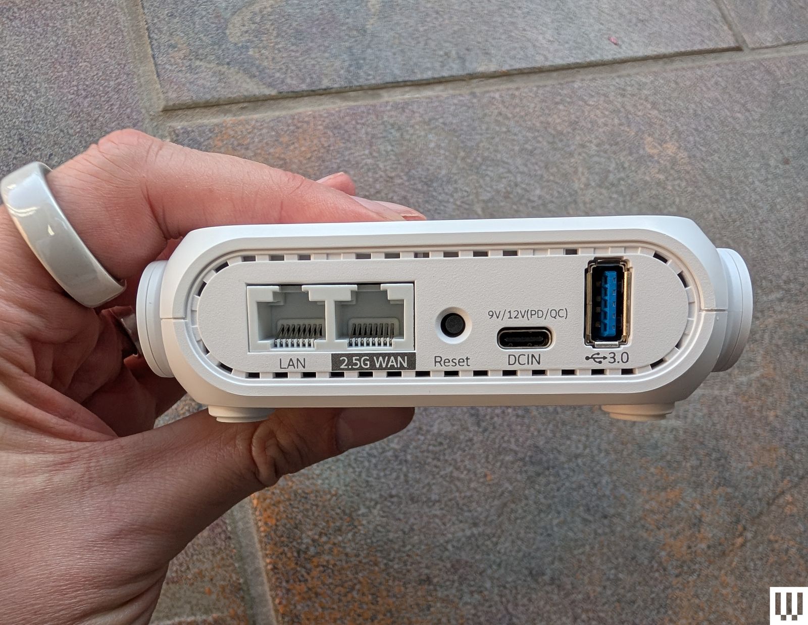 Image may contain Electronics Hardware Router Baby and Person