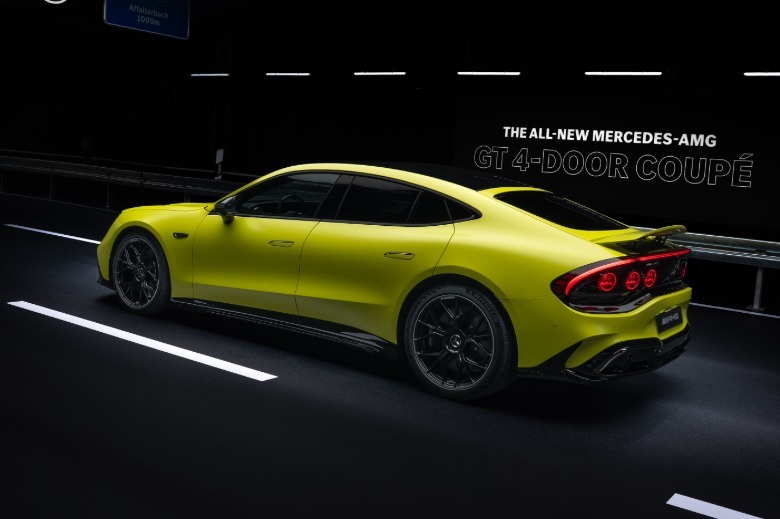 Mercedes-AMG GT 4-Door coupe in yellow shown from the side