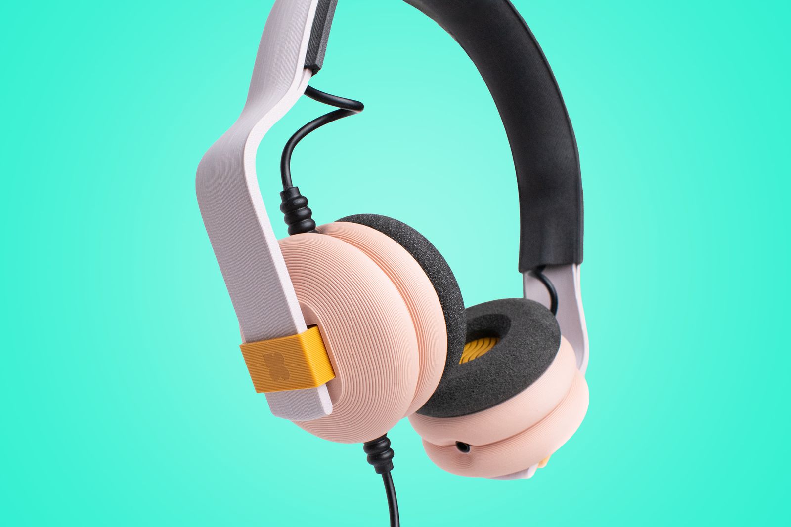Image may contain Electronics Headphones and Tape