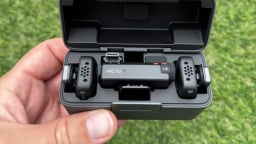 hand holding dji mic mini in its case