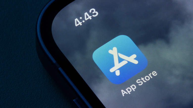 Apple App Store logo is shown on an iPhone screen