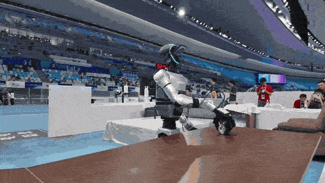 BEIJING CHINA  AUGUST 16 A humanoid robot takes part in the Hotel scenario cleaning service event on day two of the 2025...