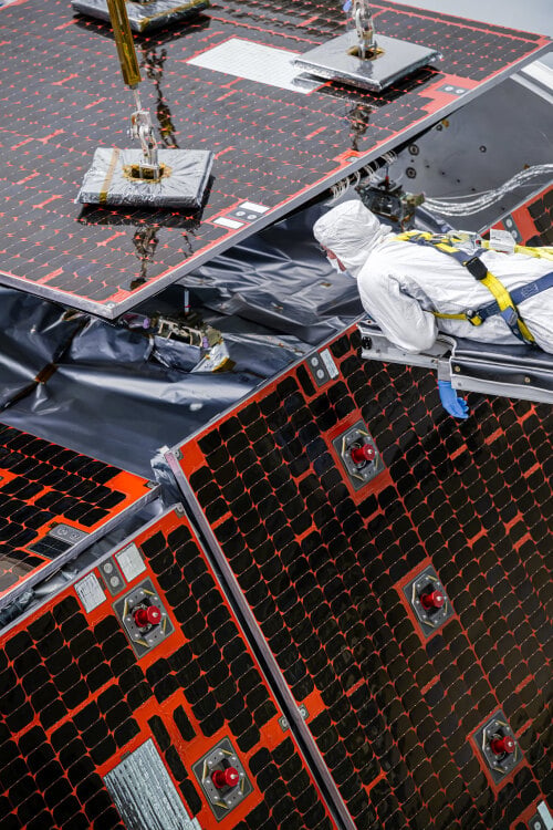 Technicians assembling the sunshield for Nancy Grace Roman Space Telescope