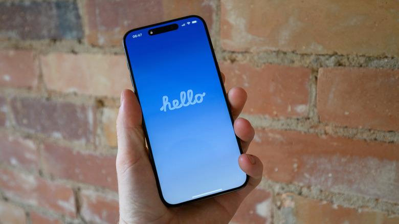 An iPhone displaying the "Hello" welcome screen.