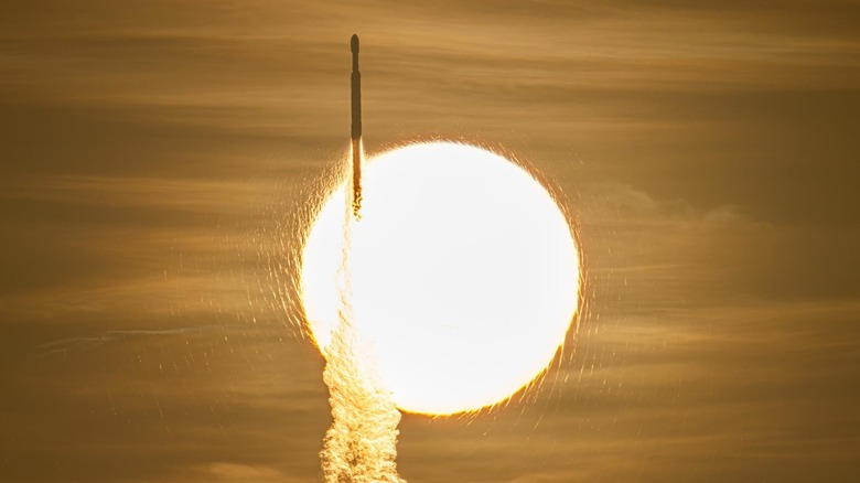A SpaceX Falcon Heavy rocket with NASA's Nancy Grace Roman Telescope on board is seen transiting the sun during launch from Launch Complex 39A at NASA's Kennedy Space Center in Florida.