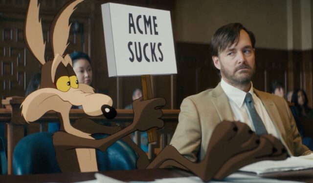 coyote in a courtroom holding up sign reading "Acme sucks"